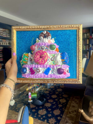 Quadro torta con ciambelle sfondo glitter blu 1