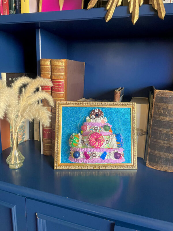 Quadro torta con ciambelle sfondo glitter blu 6